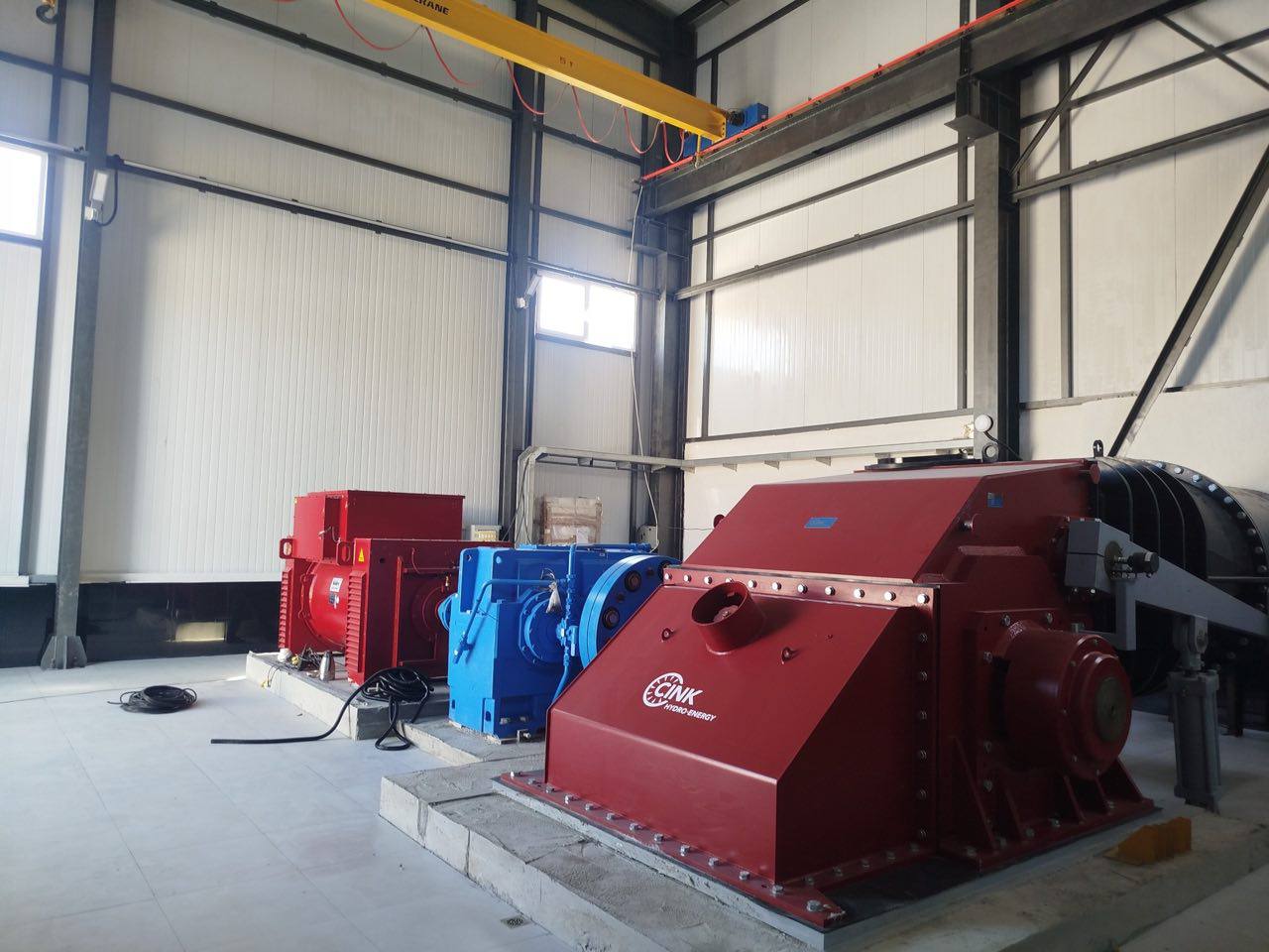 The CINK cross-flow unit installed in the powerhouse hall